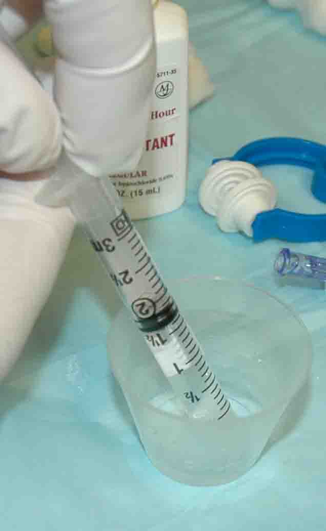 Aspirating oxymetazoline into a syringe